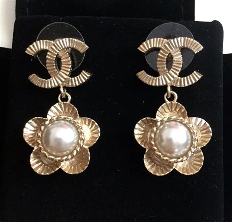 chanel earrings pearl gold|authentic Chanel pearl earrings.